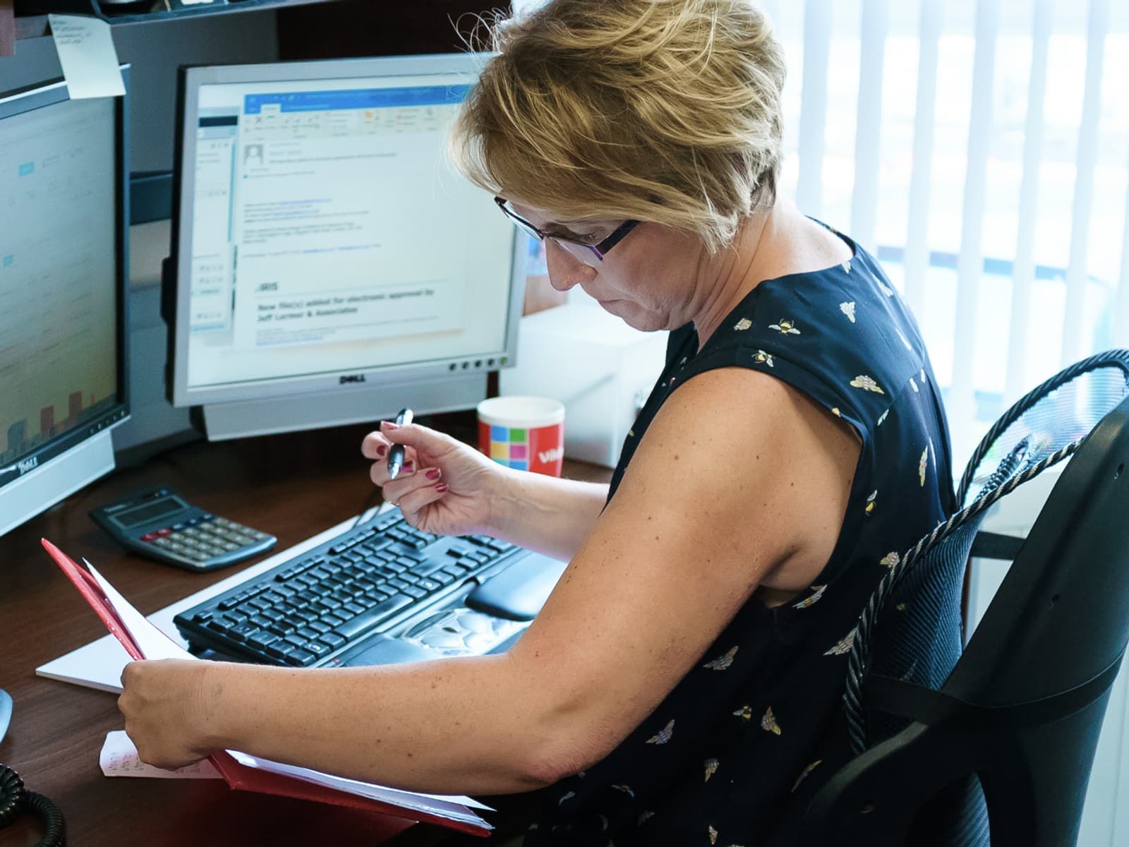 Alison Horsman at her desk in our office
